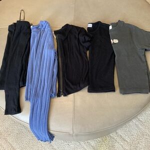 Set of five shirts two long sleeve and three short sleeve.